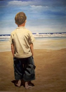 Niño mirando al mar
